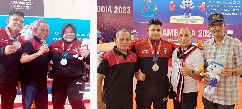 Foto bersama atlet angkat besi Aceh M Zul Ilmi dan Nurul Akmal dengan Ketua Umum KONI Aceh Kamaruddin Abubakar dan Wakil Ketua T Rayuan Sukma usai pengalungan medali di Taekwondo Hall, Olympic Complex, Phnom Penh, Kamboja, Selasa (16/5)