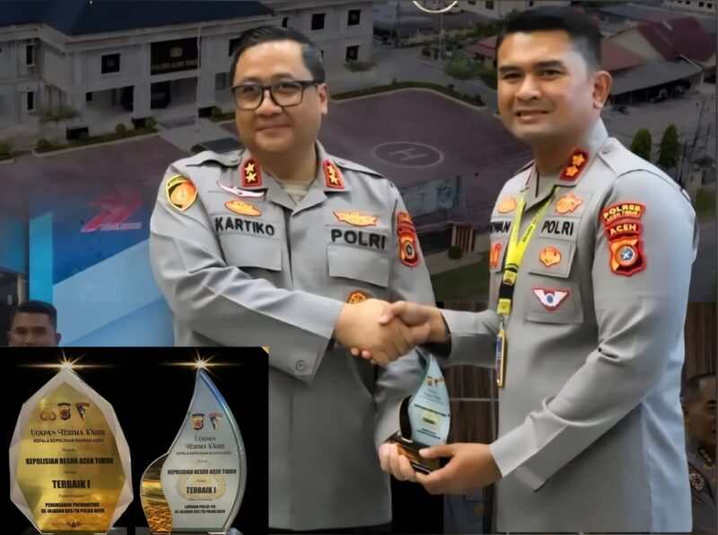 Kapolda Aceh Irjen Pol Achmad Kartiko menyerahkan dua penghargaan kepada Kapolres Aceh Timur AKBP Irwan Kurniadi, Jum'at (11/7). (Foto: Ist)