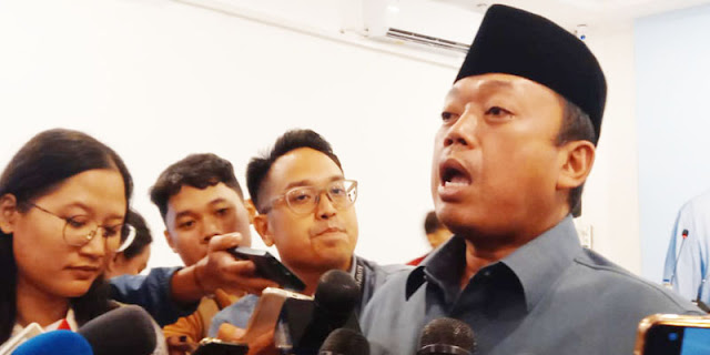 Menteri ATR/Kepala BPN Nusron Wahid saat menghadiri acara resmi, yang belakangan menuai kritik tajam usai guyon soal kepemilikan tanah.