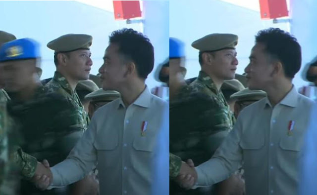 Momen Wakil Presiden Gibran Rakabuming Raka tak menyalami AHY di acara Gelar Pasukan di Batujajar, memicu spekulasi politik dan wacana pemakzulan.
