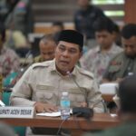 Bupati Aceh Besar Muharram Idris menghadiri Rakor Penanggulangan Bencana 2025 di Gedung Serbaguna Kantor Gubernur Aceh, Selasa (28/10).