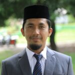 Kepala Dinas Pemberdayaan Masyarakat dan Gampong (DPMG) Aceh Besar, Carbaini SAg. (Foto: Ist)