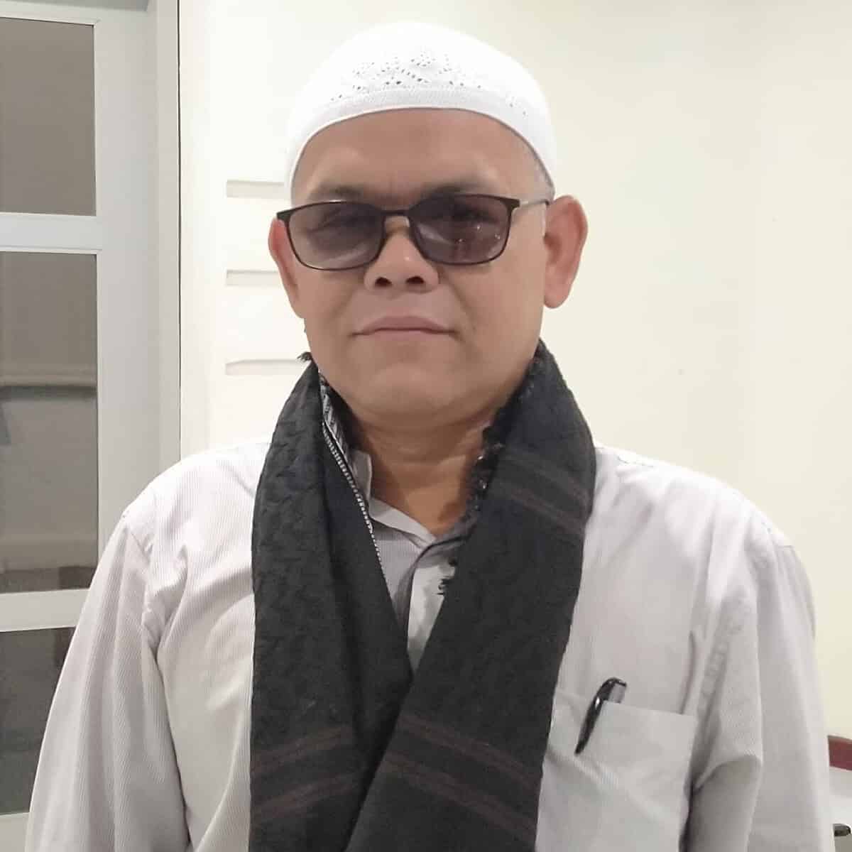 Dr Tgk H Syahminan MAg