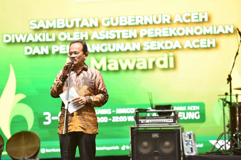 Plt Asisten II Setda Aceh Ir Mawardi, menyampaikan sambutan Pj Gubernur Aceh saat membuka Bank Aceh Action Expo UMKM 2023, Jum'at malam (4/8)