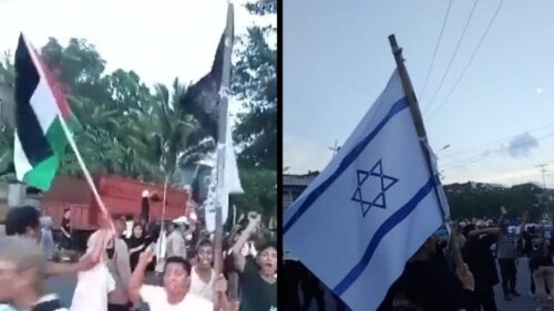 Kelompok massa aksi bela Palestina terlibat bentrok dengan organisasi masyarakat (ormas) pro Israel di Bitung, Sulawesi Utara, Sabtu (25/11). (Tangkapan Layar)